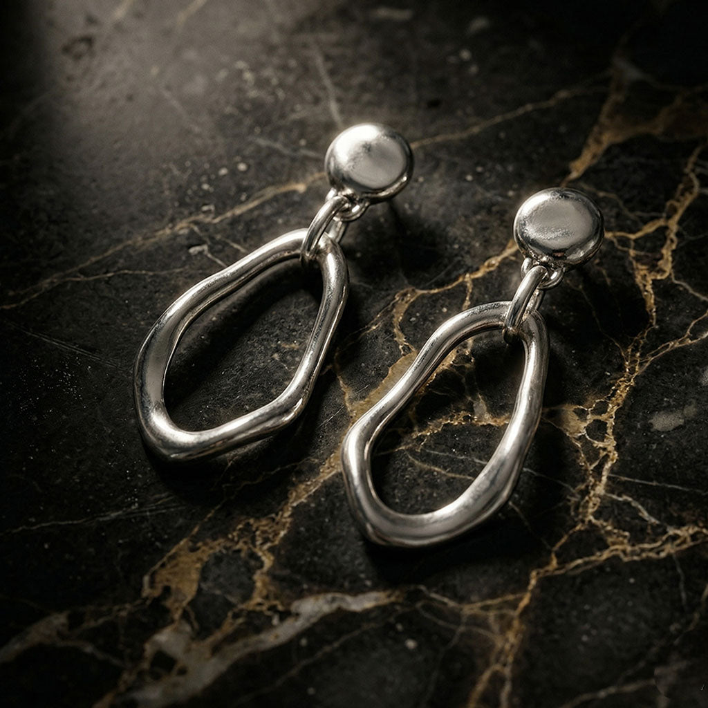 Elegante lange Ohrringe mit unregelmäßiger Oval - Form