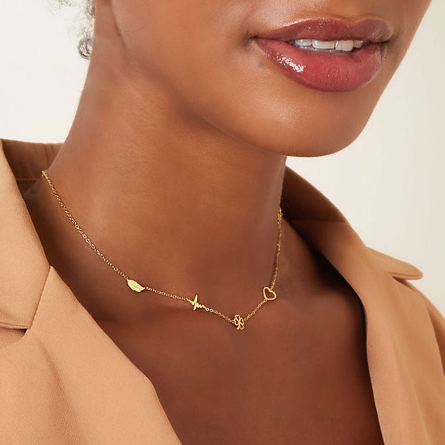 Ketten - zauberhaftes Schmuck-Set mit Kleeblatt, Herz und Feder - Gold - Beau Soleil Jewelry